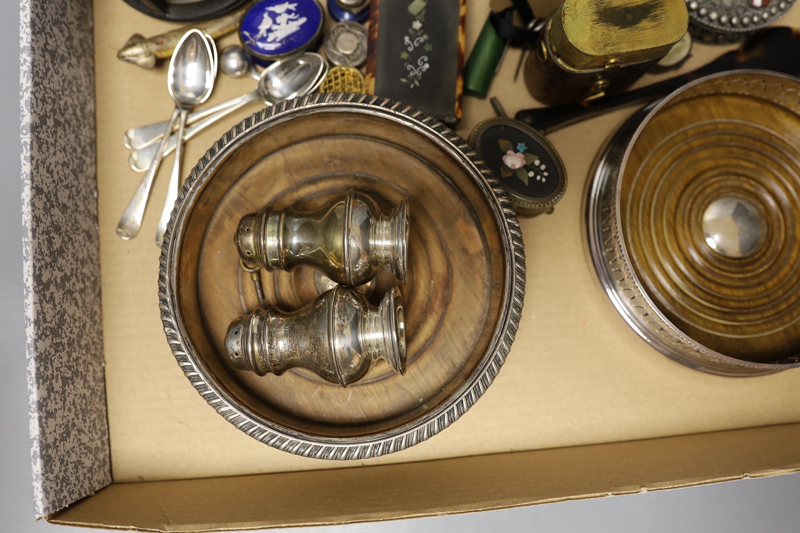 A mother-of-pearl sewing case, various charms and spoons etc